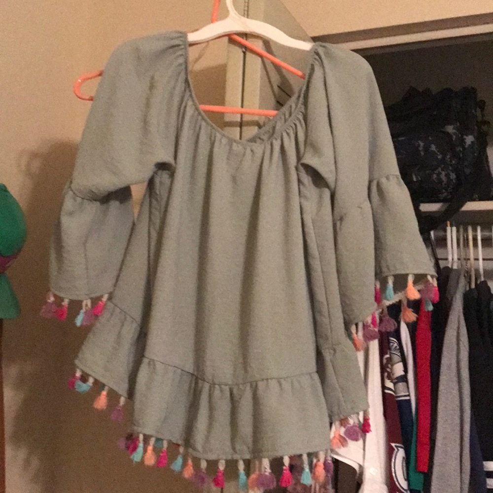 Off shoulder top with Pom Poms